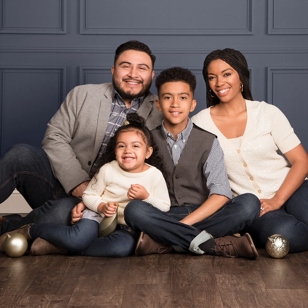Family photographed on Modern Midnight holiday background
