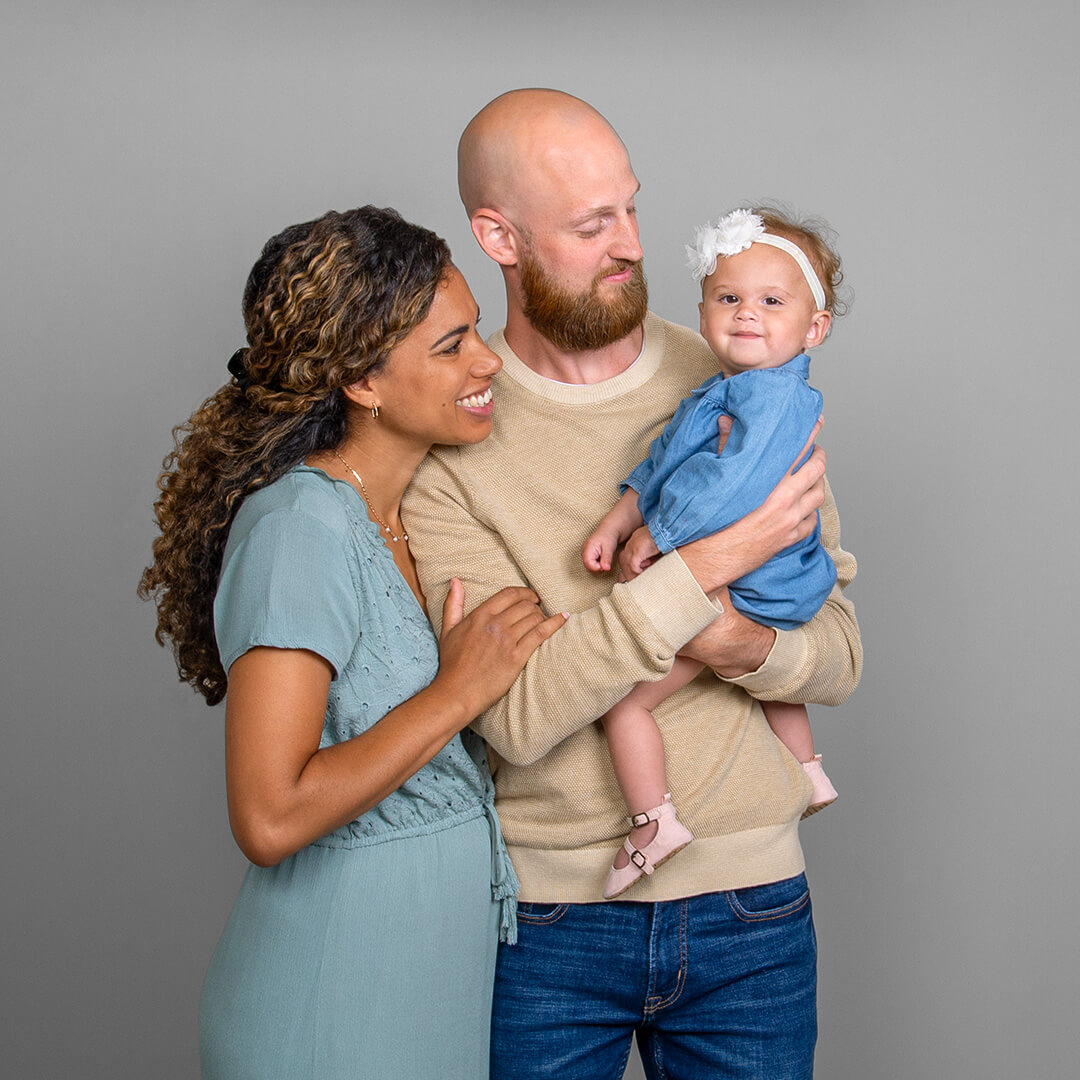 Family of 3 photographed at JCPenney Portraits