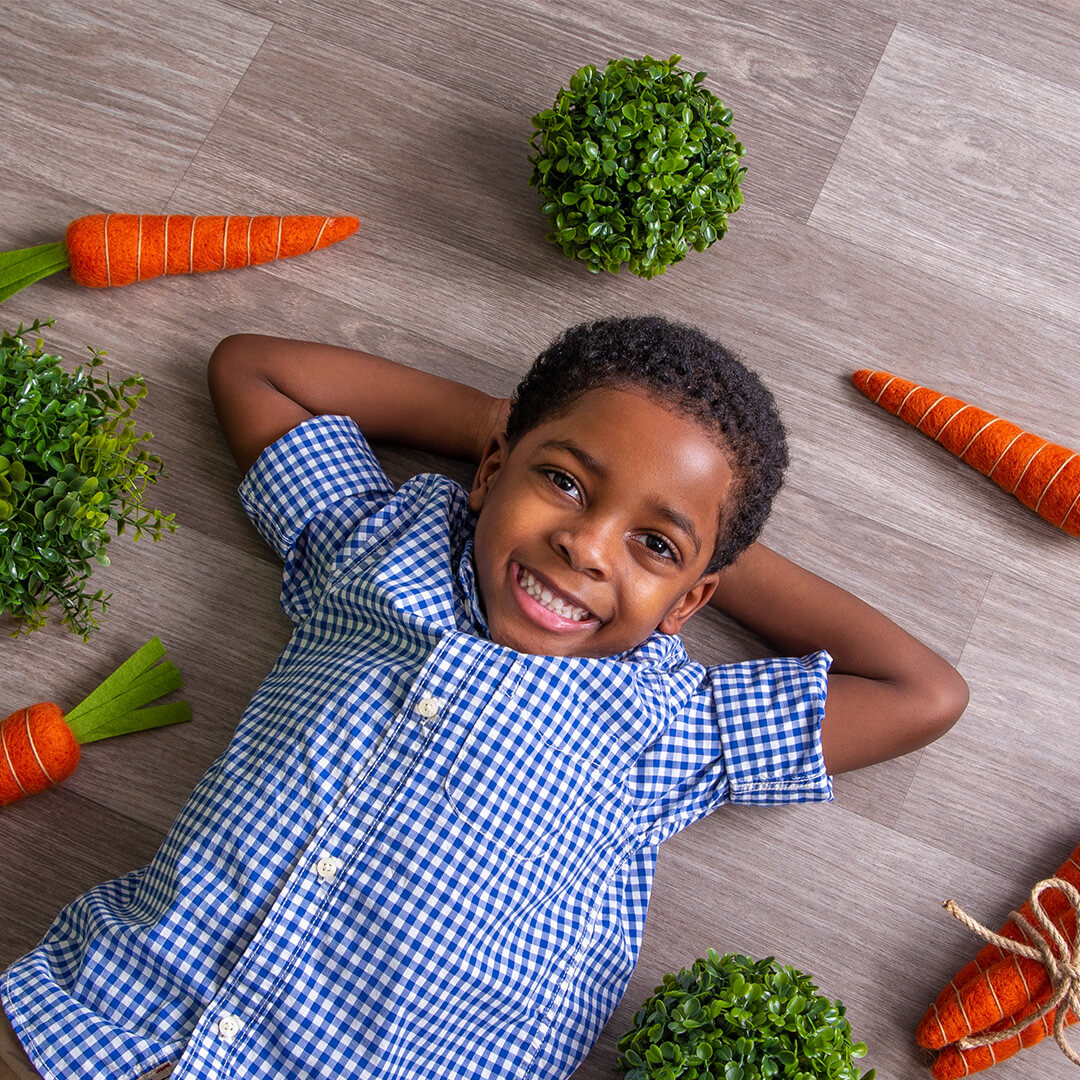Easter picture showcasing young boy with easter background.