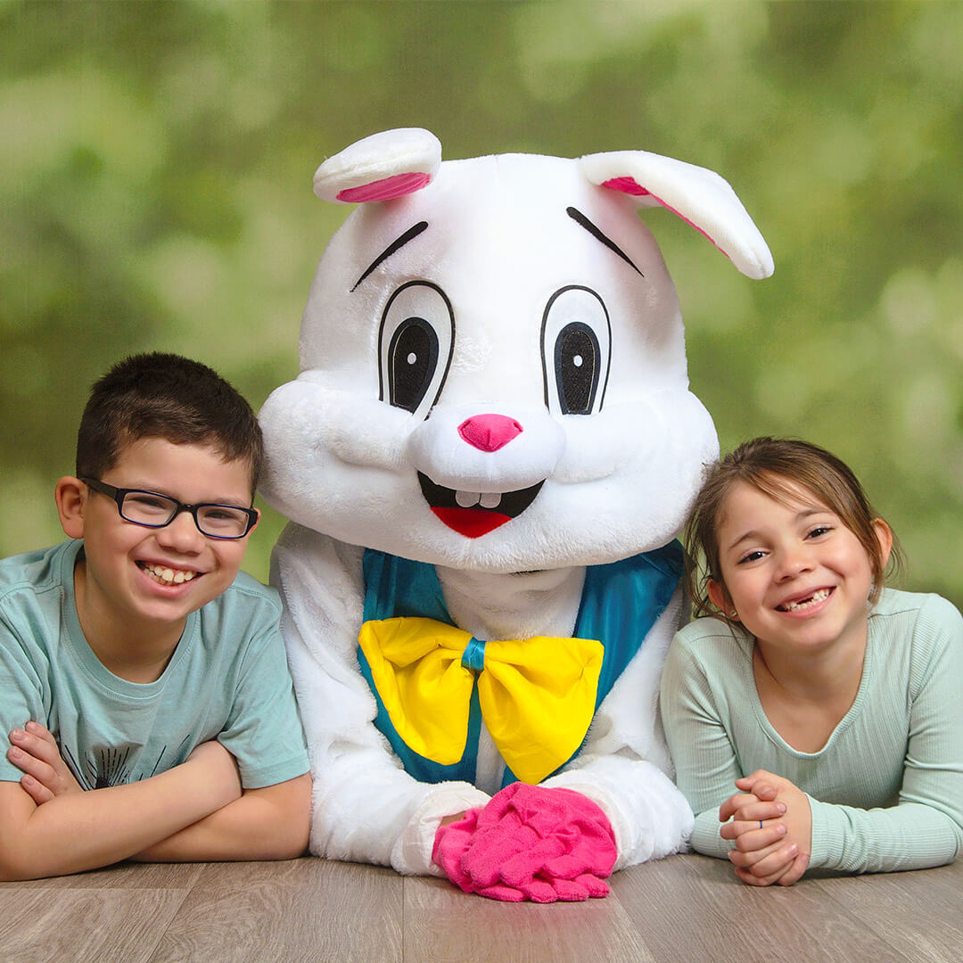 Easter photo of siblings posing with Easter Bunny.