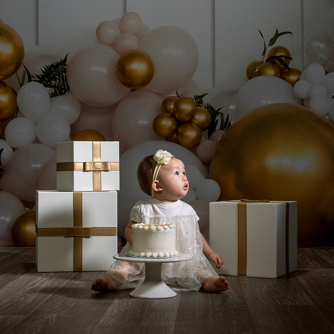 Baby birthday photoshoot captured at JCPenney Portraits.