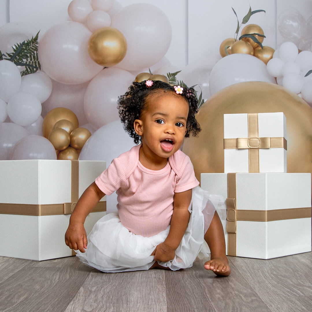 Birthday photos captured during a birthday photoshoot at JCPenney Portraits.
