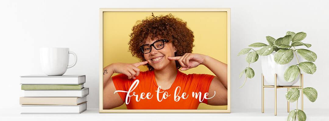 Framed print on a desk, featuring a personality photo. 